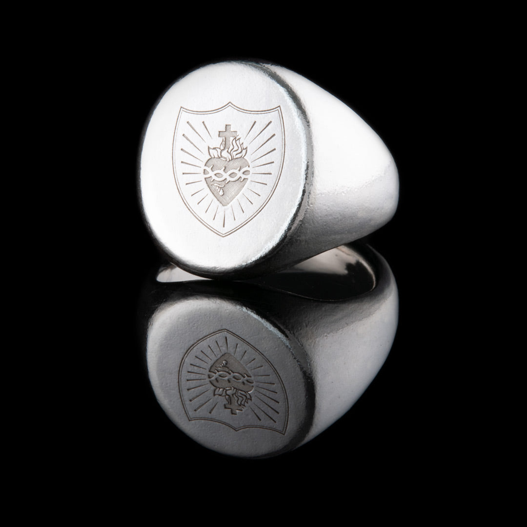 A sterling silver signet ring showing the symbol of the Pioneer Total Abstinence Association of the Sacred Heart. A jewellery commission made by NI Silver.