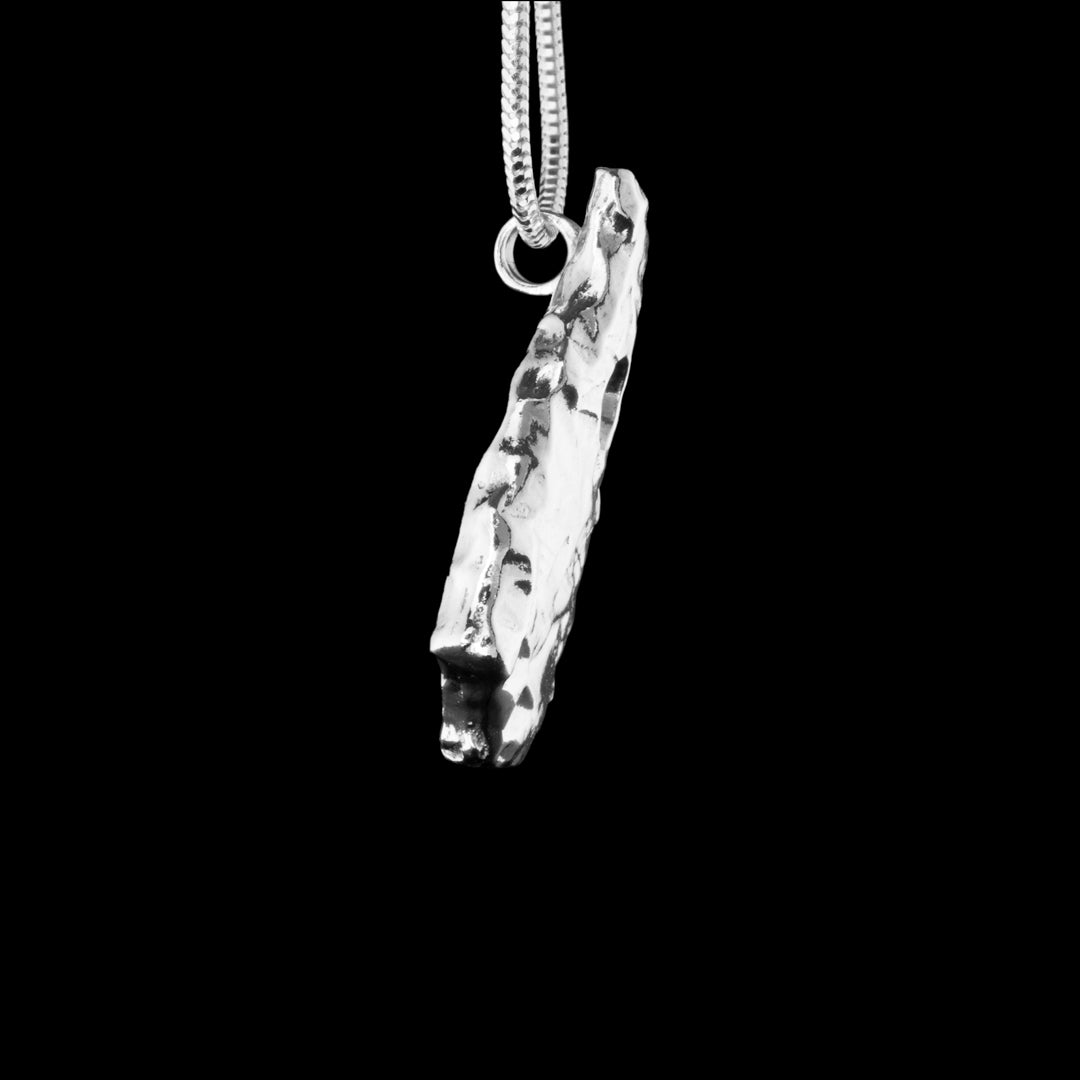 Sterling Silver Irish Hole Stone or Love Stone piece of jewellery made by Ruth McEwan-Lyon the Goldsmith jewellery maker and designer for NI Silver jewellery