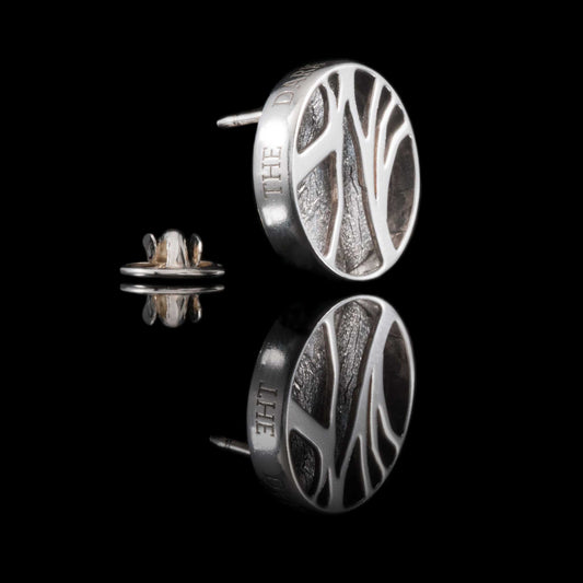 The Dark Hedges Etched Lapel Pin. Solid Silver unusual jewellery design. This version can either have the silver 'back' or an oxidised version, for an extra charge. The Dark Hedges lapel pin in silver is perfect for wedding day gifts, for any special occasions or just because you like it. The Dark Hedges have been made famous as the Kings Road in the Game of Thrones. Made by www.ni-silver.com. Irish Jewellery Designers