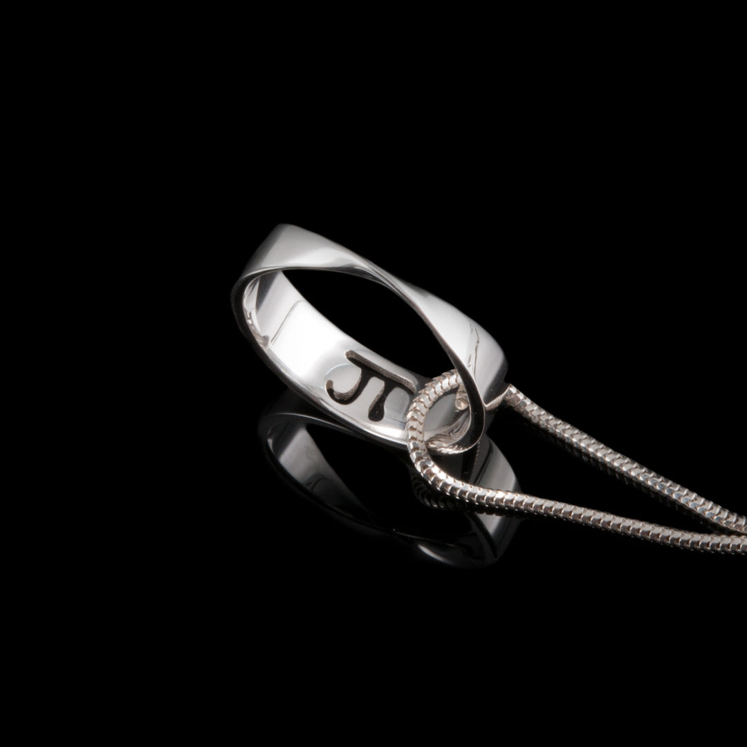 Mobius loop with the Pie symbol Silver hallmarked ring. A made to order jewellery commission by Ruth McEwan-Lyon in Northern Ireland.