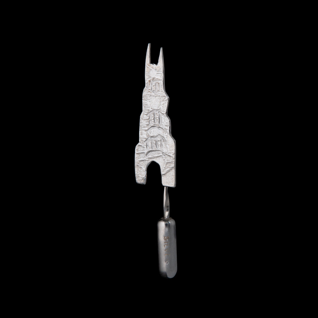 Queen's University Lapel Pin made by NI Silver as a graduation gift idea for Queen's students and families to wear. The central tallest part of the Lanyon building has been made from sterling silver with a long pin coming out of the back.