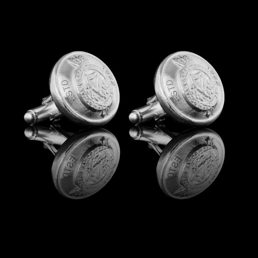 These are solid silver RUC button cufflinks.