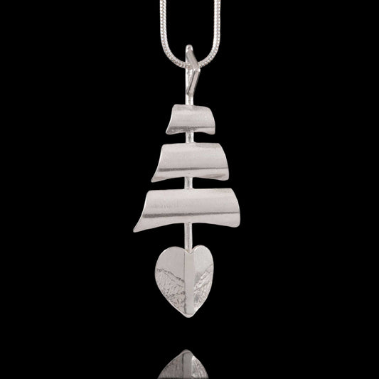 Tall Ships Silver Necklace on a snake chain. Profile of a tail ship with the hull, mast and sails made in sterling silver by NI Silver.