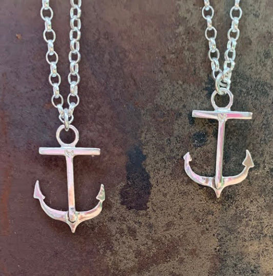 Photo shows 2 anchor necklaces hanging on their chains. These were commissioned and bespoke.