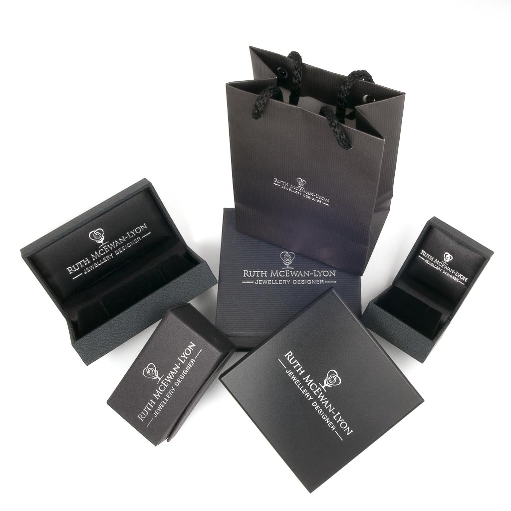 NI Silver gift packaging for your purchased silver jewellery.  Biodegradable boxes and bags with Ruth McEwan-Lyon Jewellery Designer stamped on them