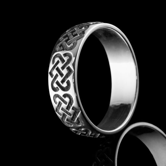 Stunning silver Celtic Love Knot wedding band with the intertwined 2 hearts creating an endless line. A bespoke wedding ring commission by NI Silver jewellery.