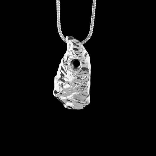 Doagh Silver Hole Stone or Love Stone Irish Standing Stone as a necklace made by NI Silver Jewellery