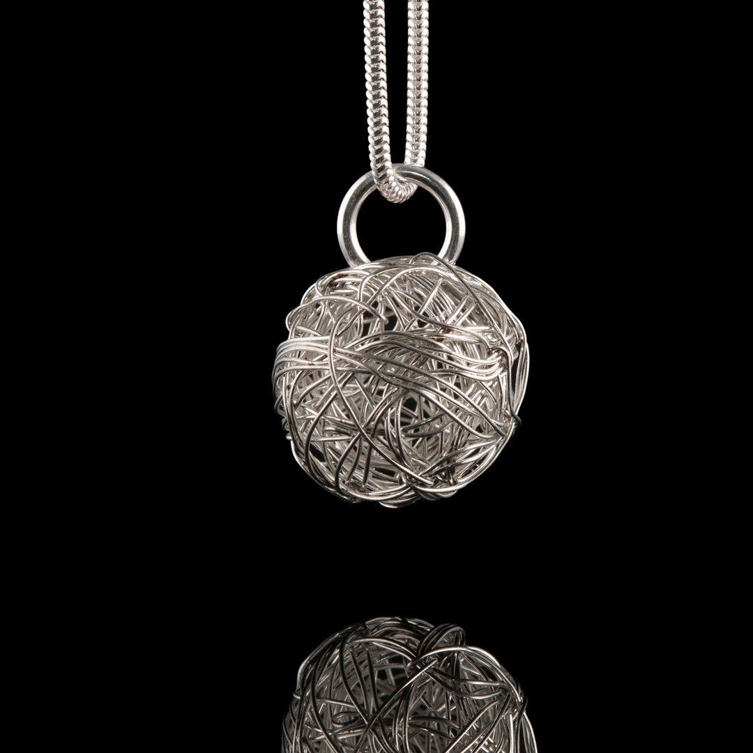 Rise Belfast Necklace, Silver wire wrapped ball on a silver snake chain.