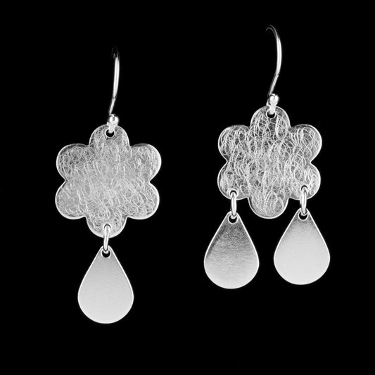 Clouds and Rain earrings handmade by NI silver out of sterling silver.  One cloud earring has one water drop hanging from it and the other has 2 drops. The clouds has a circular scratched pattern on them.