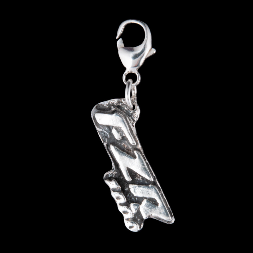 A silver FZR 1000 motorcycle charm made by NI Silver Jewellery
