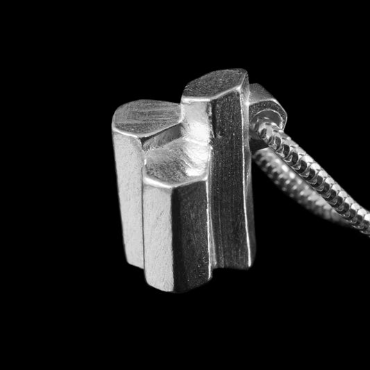 Giant's Causeway Silver Necklace on a silver snake chain.  Hallmarked and presented in stylish biodegradable gift boxes. 