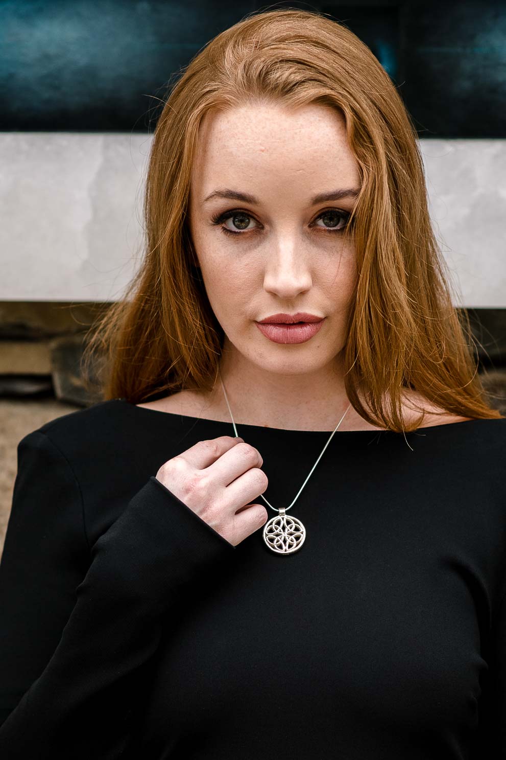 Irish Celtic Silver Dara Knot necklace being worn by a model. Made by NI Silver Jewellery of Holywood Northern Ireland.