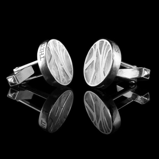 Dark Hedges Cufflinks - NI Silver Jewellery, sold silver with engraving of The Dark Hedges arocs the circular shape with the outline of trees cut out
